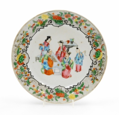 A 19thC Cantonese porcelain plate, decorated in enamels with figures and floral border, 21cm diameter.