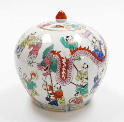 A Chinese porcelain jar and cover, decorated in coloured enamels with a dragon festival, red four character mark to the base, probably 20thC, 21cm high. - 2