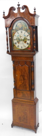 W B Cornforth, Macclesfield. A mid 19thC longcase clock, the elaborate arched moon phase dial, painted with female figures, churches and a cottage, etc., with an eight day four pillar movement, in boxwood strung figured mahogany case, 328cm high.