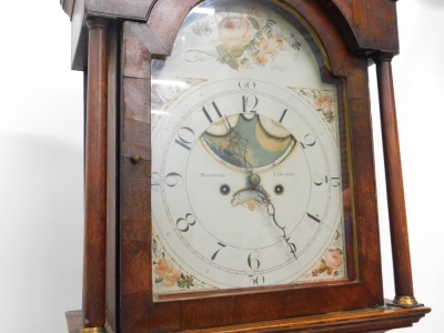 Marshall, Lincoln. An early 19thC longcase clock, the arched dial painted with flowers and with a central moon phase, decorated with a sailing ship, etc., with an eight day four pillar movement in an inlaid oak and mahogany case, 222cm high. - 2