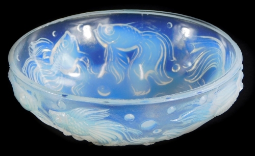 A Sabino opalescent art glass bowl, moulded with fantail goldfish, in the manner of Lalique, stamped to underside, 12cm diameter.