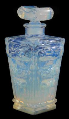 A Sabino opalescent art glass scent bottle and stopper, of tapering form decorated with scrolls, etc., stamped to underside Made in France, 1272, 8.5cm high.