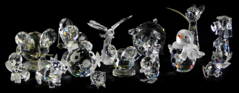 A collection of Swarovski Crystal items, to include a pig, snowman, dog, dragonfly, cat, squirrel, various loose crystals, etc.