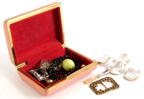 A small group of costume jewellery, comprising mother of pearl type buttons, a silver topped and mother of pearl holder, a novelty silver plated lemon drop squeezer, buckles, necklaces, scarf pins, etc. (1 box)