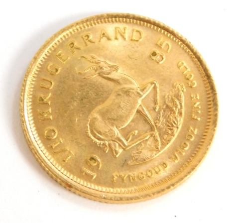 A South African 1/10th of a Krugerrand coin dated 1985.