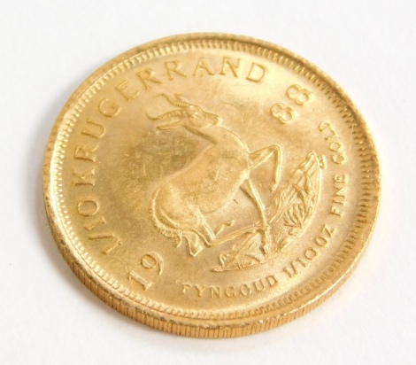 A South African 1/10th of a Krugerrand coin dated 1988.