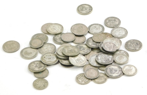 A quantity of one shilling and other coins, to include some silver.