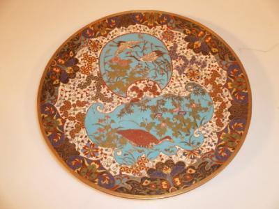 A Meiji period Japanese kyoto ware cloisonne charger decorated with floral