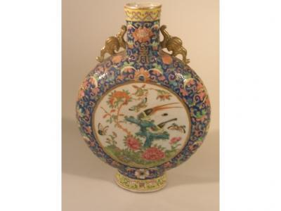 A 19thC Chinese moon flask with applied gilt shoulder handles the outer