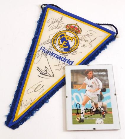 A collection of Real Madrid Football Club memorabilia, to include a signed pennant, with certificate from Bid 4 Sport, bearing signatures of David Beckham, Roberto Carlos, Ika Casillas, Zinedine Zidane, etc., and a photograph bearing signature. (2)