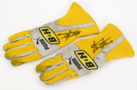 A pair of Benson & Hedges Jordan Puma brand driving gloves, signed by the Formula 1 Driver Giorgio Pantano.