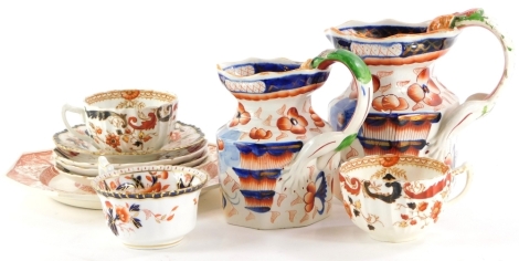 Two 19thC ironstone jugs, each decorated in Imari colours with flowers, etc., stamped to underside Ironstone China, and other ceramics. (AF)