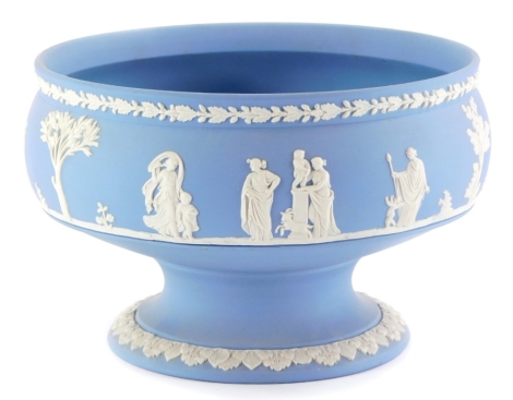 A 20thC Wedgwood blue Jasperware bowl, decorated with an all round classical scene, impressed marks beneath, 20cm diameter.