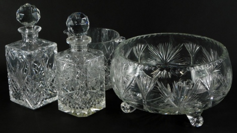 Two crystal square section decanters, with faceted stoppers, 27cm and 25cm high, respectively, a wine cooler and a bowl. (4)