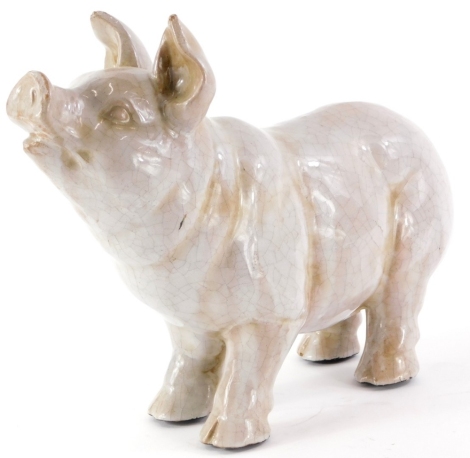 A studio pottery figure of a pig, with crackle glaze, unmarked, 30cm long.