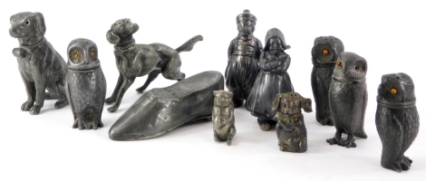 A collection of pewter novelty cruets, etc., to include dogs, owls and a shoe shaped snuff box, etc.