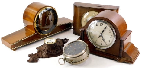 A collection of clocks, to include a Kenzle mantel clock in mahogany case with Westminster chime, a savings clock, mahogany mantel clock with presentation plaque, a plated alarm clock and a Cartel shaped wall clock with quartz movement. (5)