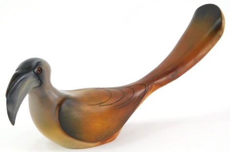 A Knysna artist feathers collectors carved wooden figure, modelled in the form of a grey hornbill, series 1, numbered 91 of 975, 38cm long.