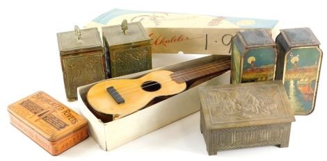 Various collectibles, to include a pair of biscuit tins, each decorated with European scenes, a Chinese Ukulele in original box, and various other tins.