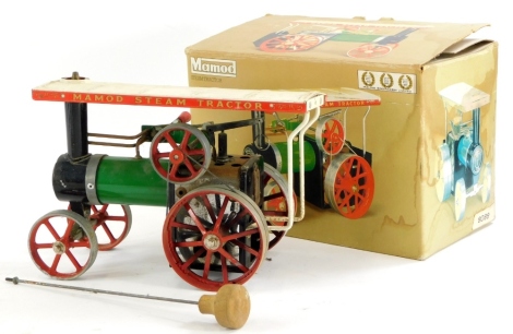 A Mamod steam tractor, in black and green livery, with original box.