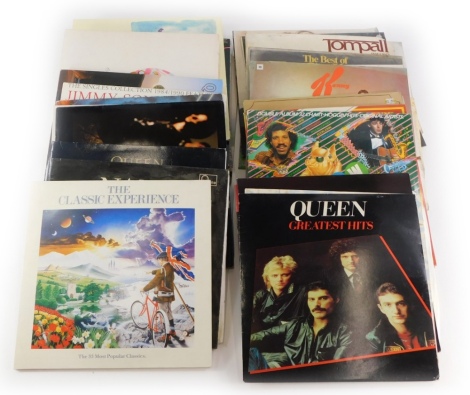 A quantity of LP records, to include Queen, Greatest Hits, Night at the Opera, Made in Heaven, Meatloaf Bat out of Hell, 1980's and 90's pop, Genesis, Cliff Richard, John Lennon, etc.