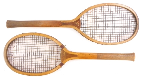 Two vintage tennis rackets, one stamped KJ Knutton, and with owner stamp for Gertie Bray, the other Thornton and Co Limited Unique. (2)