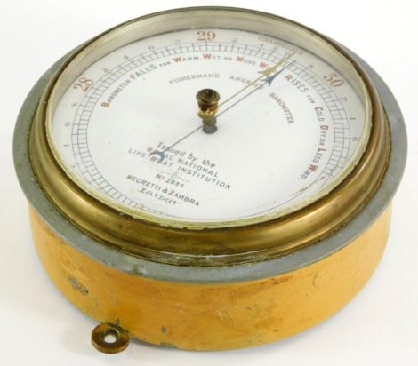 A Negretti & Zambra Fishermen's Aneroid barometer, the dial printed, issued by the Royal National Lifeboat Institution number 2335, 15cm diameter.