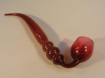 A Victorian cranberry glass novelty pipe