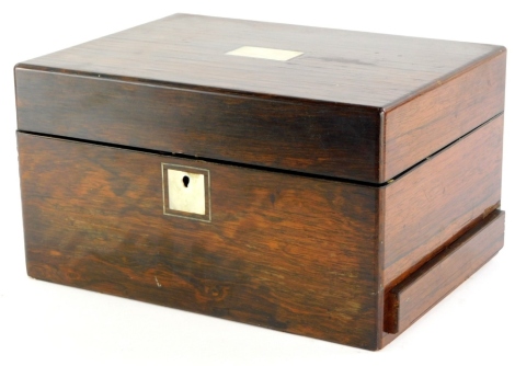 A Victorian rosewood jewellery or workbox, with rectangular mother of pearl inlaid vacant cartouche to the hinged lid, enclosing a part fitted interior and a drawer to the side, 30cm wide.