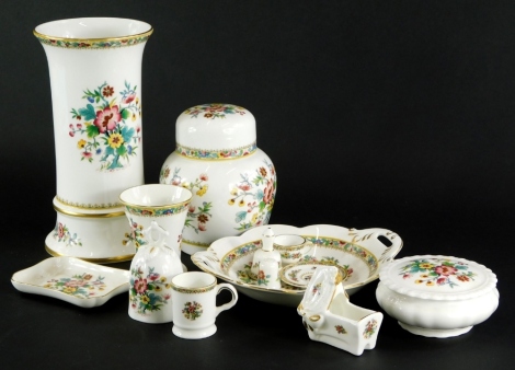 A quantity of Coalport Ming Rose pattern ceramics, to include a tapering vase, miniature cot, etc.