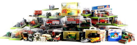 A quantity of modern die cast collectable toys, agricultural machinery to include tractors, Del Prado series Fire Engines, etc.