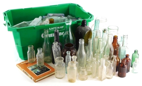 A quantity of excavated and other mineral and chemist bottles, a book on bottle collecting, etc. (2 boxes)