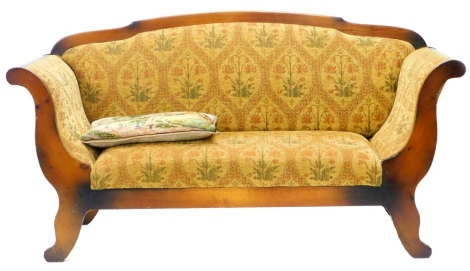 A continental Beidermeier type sofa, with a stained pine frame upholstered in patterned gold coloured fabric, on splayed legs, 188cm wide. The upholstery in this lot does not comply with the 1988 (Fire & Fire Furnishing) Regulations, unless sold to a know