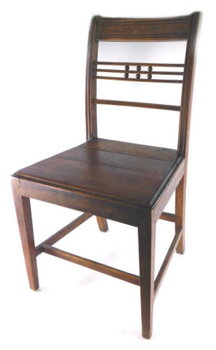 A 19thC country made oak side chair.