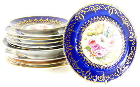 A collection of 19thC Coalport type dishes and plates, with bleu de roi and gilt decorative borders and floral sprays.