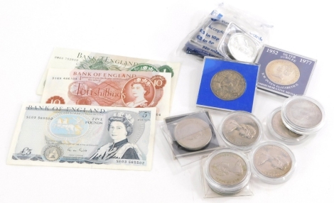 Modern £5 notes, commemorative crowns and coins.