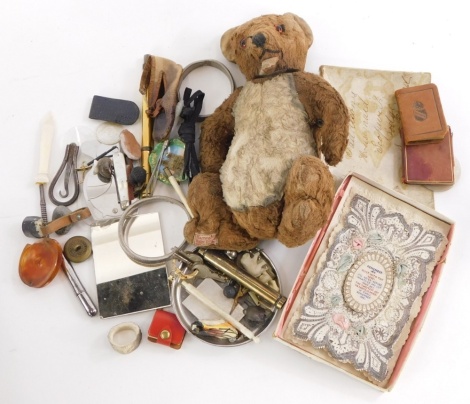 Various bygones collectables, etc., a Remember Me Blessed with Thy Love decorative card, early 20thC plush jointed kangaroo style teddy bear, 22cm high, with Harringtons baby food label, bracelets, fossil, bygones, mother of pearl gaming counter, etc. (a 