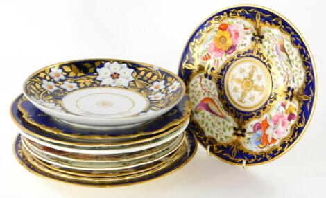 Various decorative cabinet plates 19thC and others, a 19thC Coalport style example, decorated with birds and flowers with gilt highlights on a powder blue ground, 22cm diameter, various other florally decorated cabinet plates, with gilt highlights, 19thC 