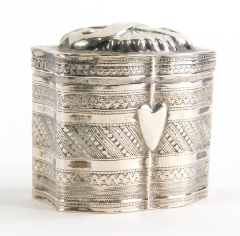 A late 19thC/early 20thC white metal box, of inverted rectangular form, with domed cross lid, partially engine turned with a vacant heart shaped cartouche, mark beneath probably Dutch, 4cm high, ½oz.