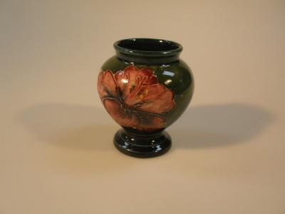 A Moorcroft pottery small baluster vase