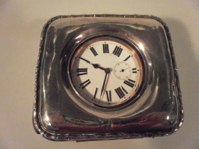 An Edwardian VII silver faced watch holder