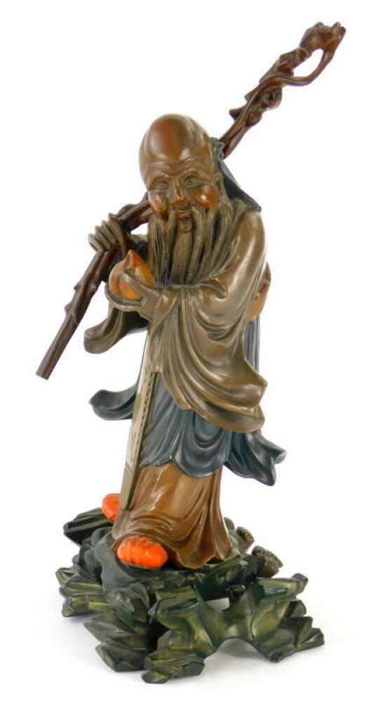 A carved figure of Jurogin Chinese God of wisdom, heavily carved and ...