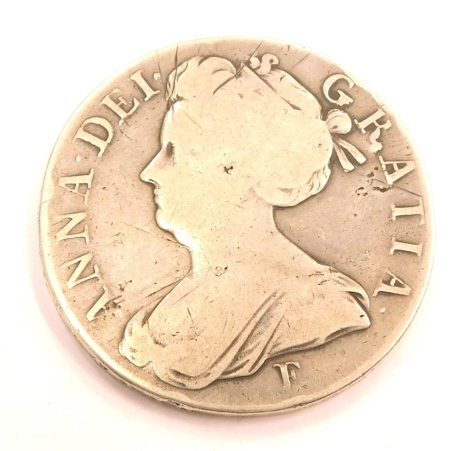 A Queen Anne crown 1708 coin.