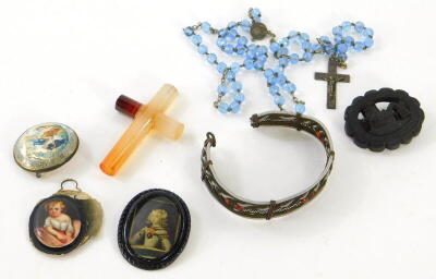 Various jewellery and effects, a mid 20thC portrait miniature porcelain plaque, of oval form inset with a child, 3cm high, bangle, other miniatures, jet style brooch set with horse, etc., (a quantity).