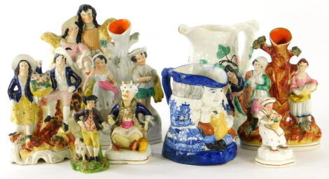 Various 19thC Staffordshire pottery, an Allertons style Toby jug, transfer printed with a Willow pattern, 15cm high, Staffordshire figures, John Walton type early 19thC figure of a huntsman aside dog, polychrome decorated, 12cm high, etc., (a quantity).