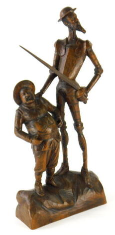 A heavily carved Ouro Spanish figure group of Don Quixote, marked beneath, 56cm high.