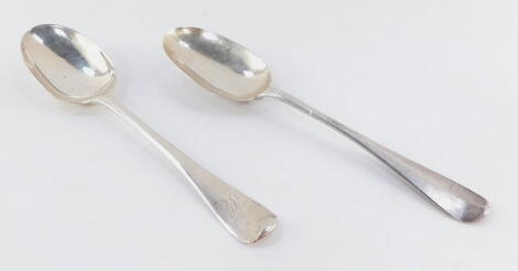 Two Georgian silver table spoons, Old English pattern, with plain bowls, one initialled, probably John Ladyman, London 1713, 19cm wide, 4oz. (AF)