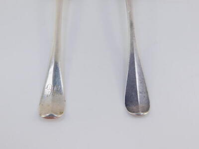 Two Georgian silver table spoons, Old English pattern, with plain bowls, one initialled, probably John Ladyman, London 1713, 19cm wide, 4oz. (AF) - 3