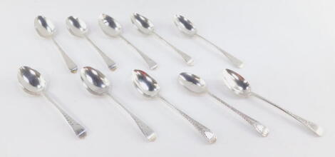 A matched set of ten 19thC silver teaspoons, bright cut, Old English pattern, initialled, with plain bowls, Exeter 1830 and other assays, 5oz.
