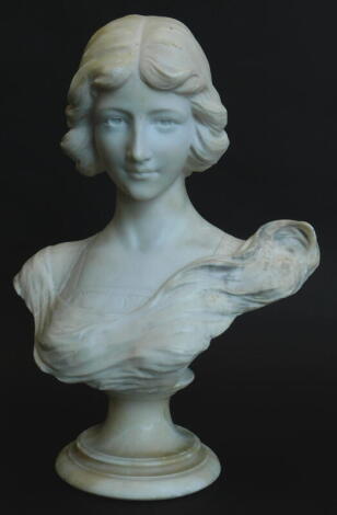 A late 19thC Italian alabaster bust of a lady, carved wearing a flowing dress, on an associated alabaster socle, 49cm high. (AF)